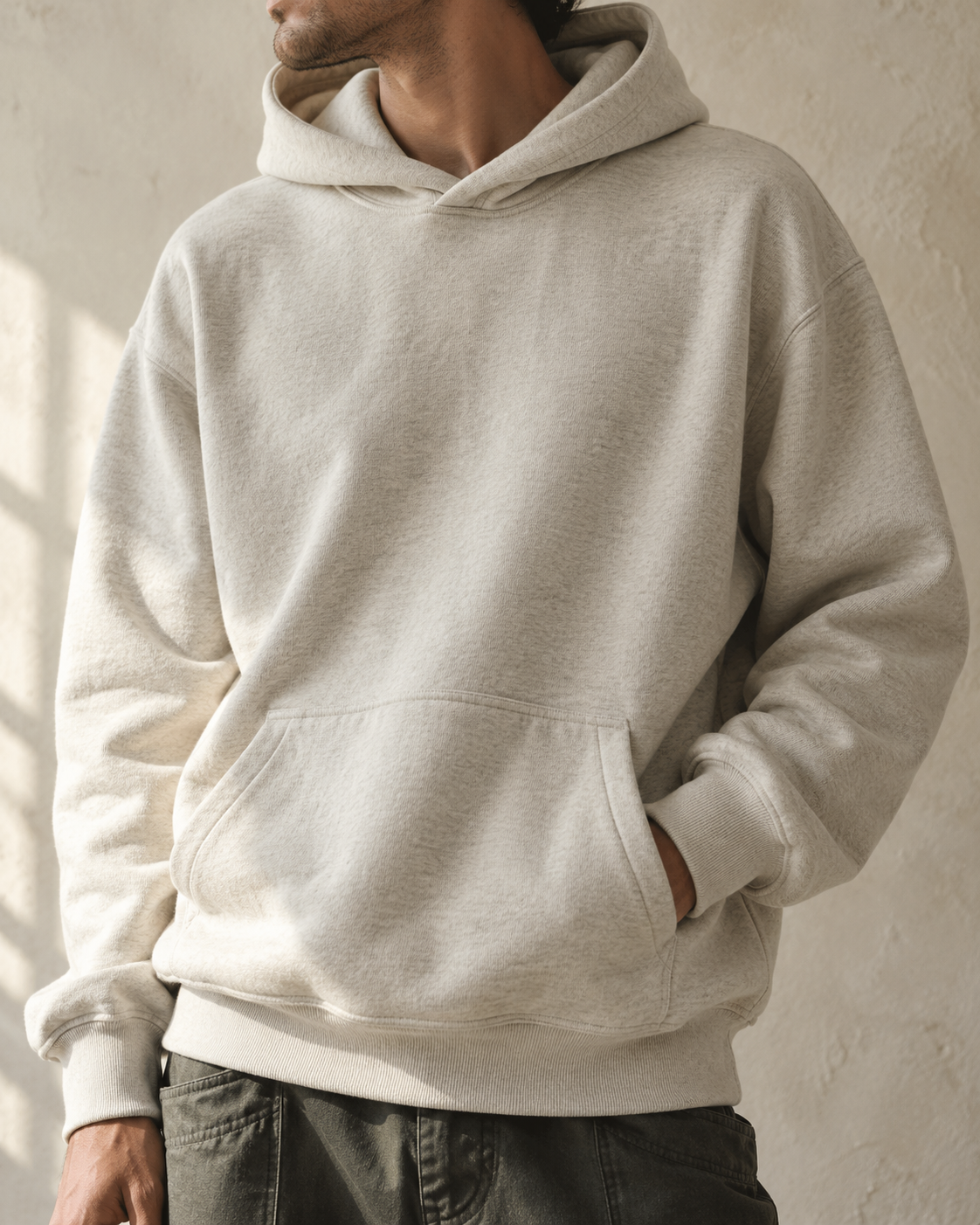 Style inspiration showing an oatmeal hoodie and relaxed layering